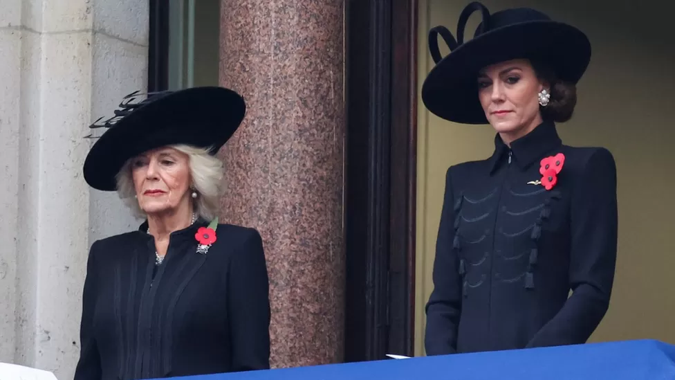 Queen Camilla and the Princess of Wales watch on as the Remembrance Sunday service takes place on Whitehall
