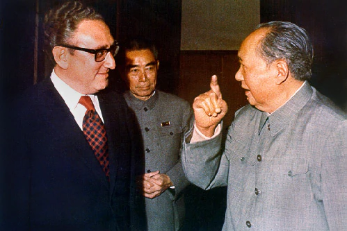 Henry Kissinger meets Mao Zedong (right) and Zhou Enlai in 1973