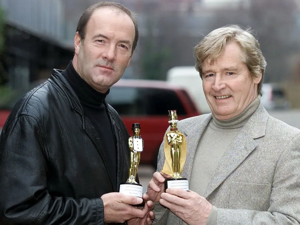 Pictured with Coronation street actor William Roache (aka Ken Barlow) with their 'Soap Oscars' in 2001