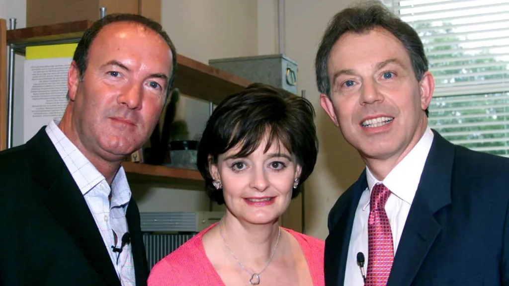 Former prime minister Tony Blair and his wife Cherie on the set of Brookside with Sullivan in 2001