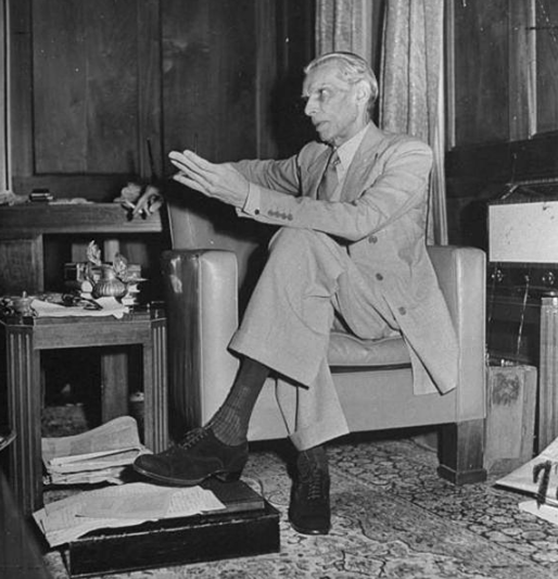 Jinnah wearing a suit