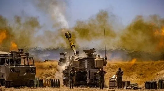 Israel threatens an "air, sea, and land" attack on Gaza.