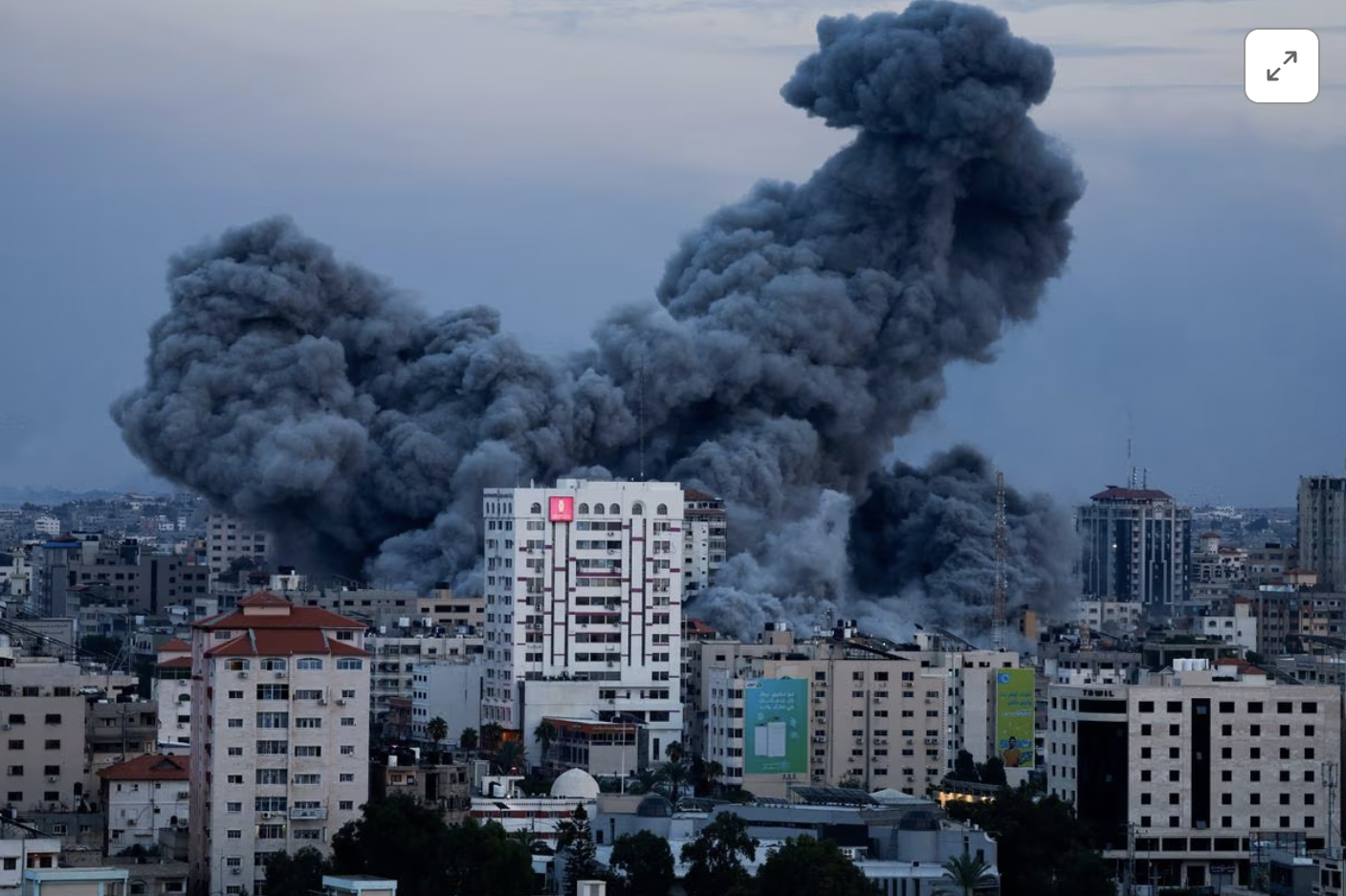 Smoke and flames billow after Israeli forces struck a high-rise tower in Gaza City, October 7, 2023. PHOTO: REUTERS