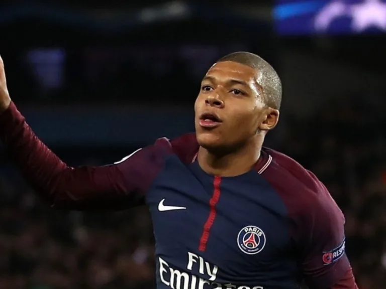 Mbappe scores a hat trick to help PSG overcome Reims.