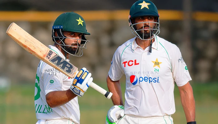 Pakistan trailed by 124 runs after Shan and Abdullah scored fifty on the second day of the Melbourne Test